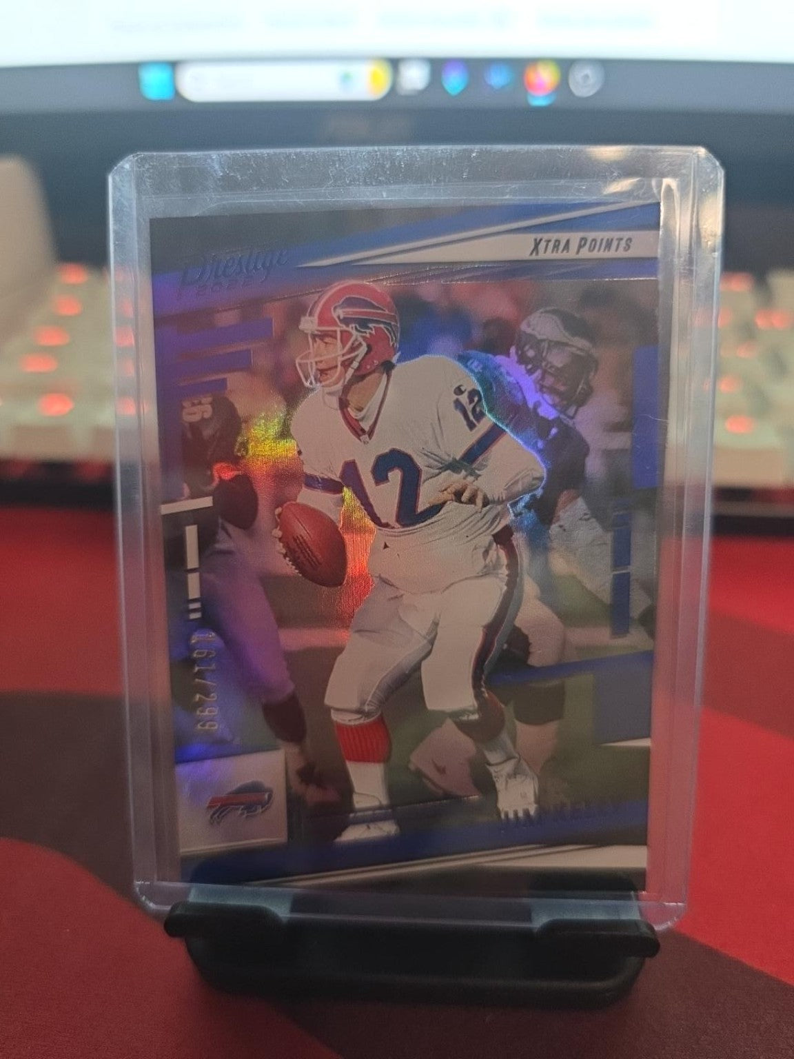 2022 Panini Prestige Xtra Points Blue Jim Kelly #38 /299 – Buffalo Bills.